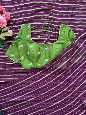 Purple chiffon saree with green hand worked blouse